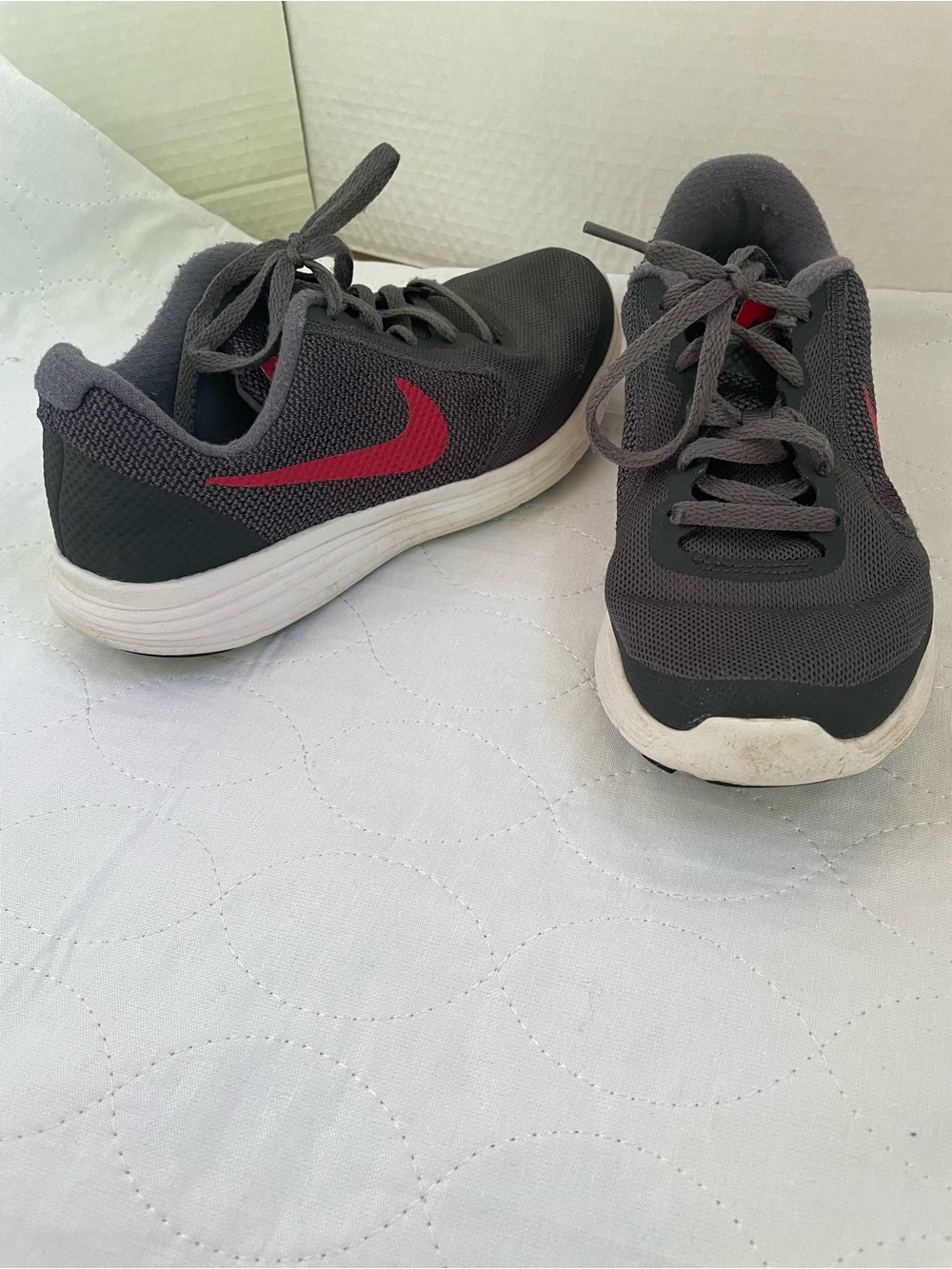 Nike Kids Dark Gray Sneakers with Red Swoosh
